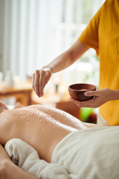 istock Masseuse Pinching Salt Scrub 1440149661