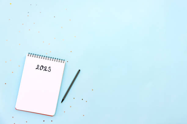 istock Top view of empty notebook ready for New 2023 Year planning or wish list 1440149730