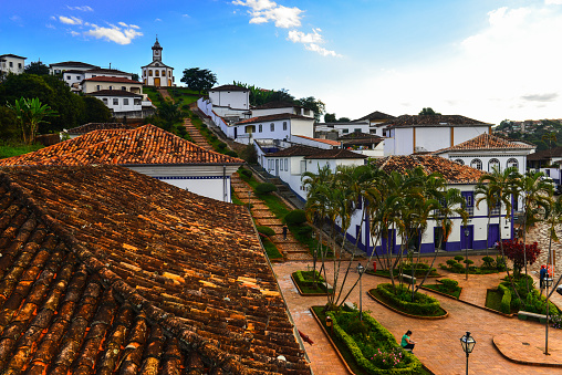 A view of the main square and the hilltop Igreja de Santa Rita church, both connect by a staircase, in the historic small town of Serro, a remote colonial gem near Diamantina, Minas Gerais, Brazil