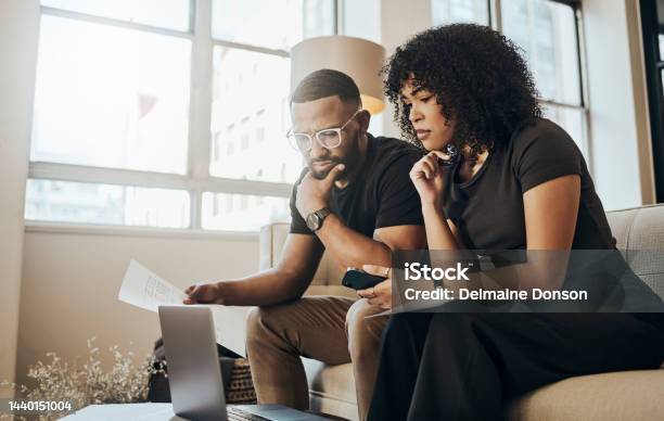 Laptop Paper And Couple With Mortgage Bills Or Loans Doing Financial Calculations Together At Home Computer Finance And Young People From Puerto Rico Paying Debt With Online Internet Banking Stock Photo - Download Image Now