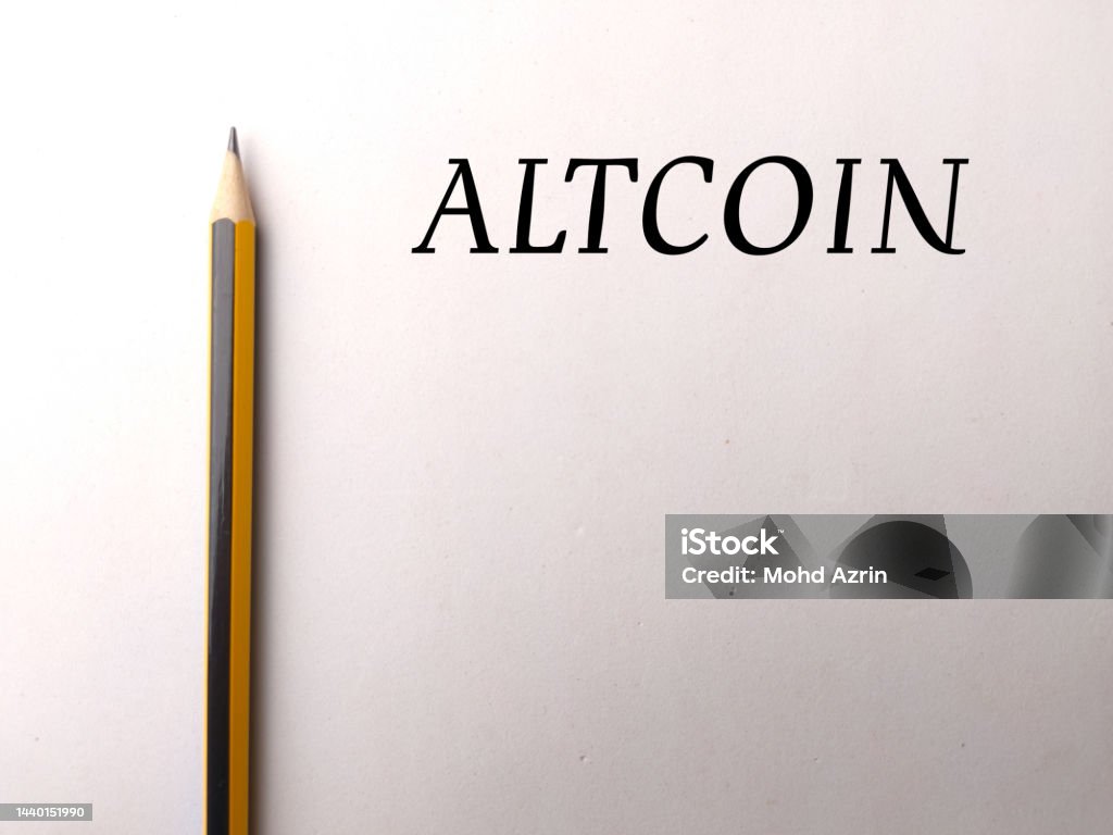 Pencil with text ALTCOIN on white background. Altcoin Stock Photo