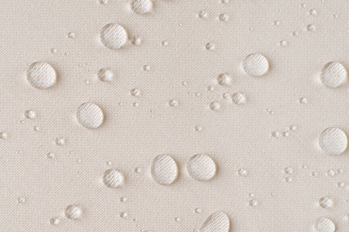background texture beige fabric with water drops