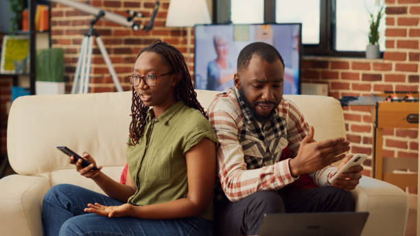 istock Angry couple having argument and fighting at home 1440157239