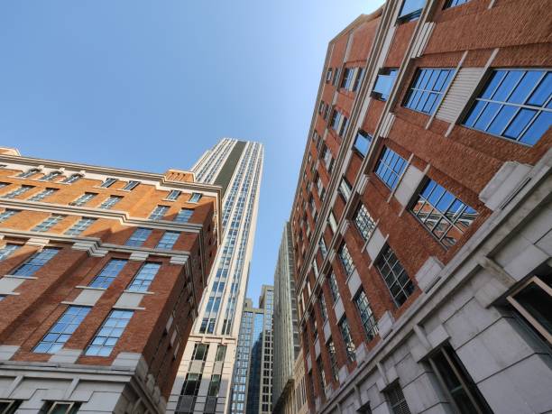 istock skyscraper and office buildings, extending to sky 1440158342