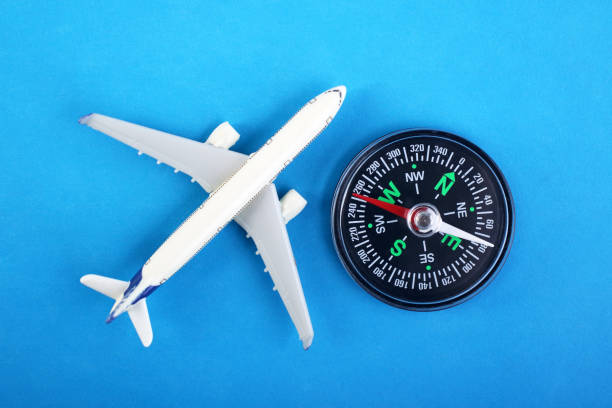 istock Airplane model with compass,Travel Concept 1440159315