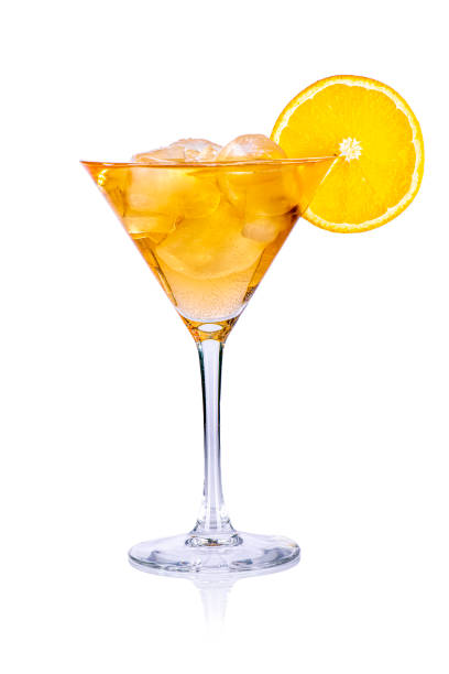 istock Yellow drink with ice cubes and orange slice on white background, isolated 1440160663