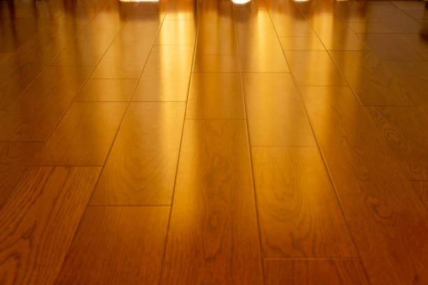 istock Wood flooring that reflects the sunlight from the window 1440164214
