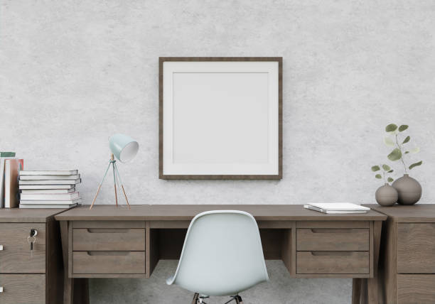 istock Picture frame attached to the wall, with chairs and vases placed on the table. 1440167995