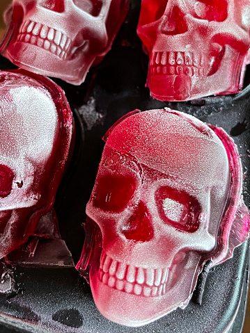 skull with red devil horns isolated on white background