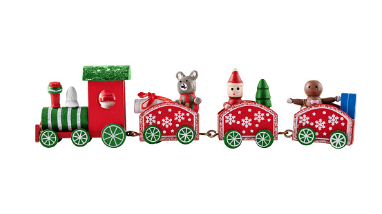 Red Christmas toy train isolated on white. Christmas greeting card.