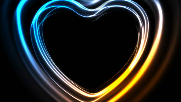 istock Glowing neon yellow and cyan abstract heart background 1440176235