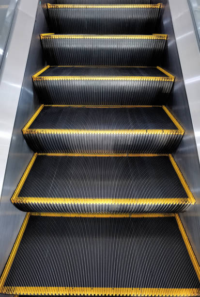 istock Close up of moving staircase 1440186759