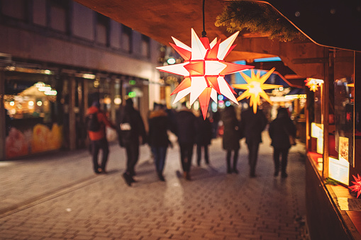 Illuminated poinsettia at the Christmas market in Germany