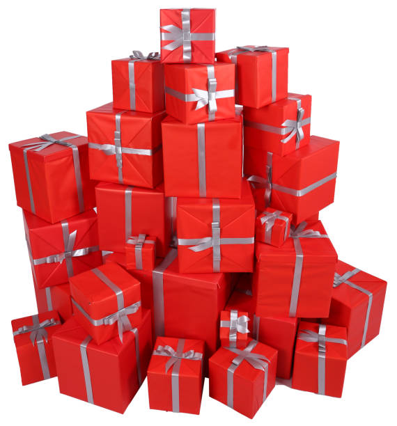 istock Pile of Christmas presents in red gift wrappings 1440188633