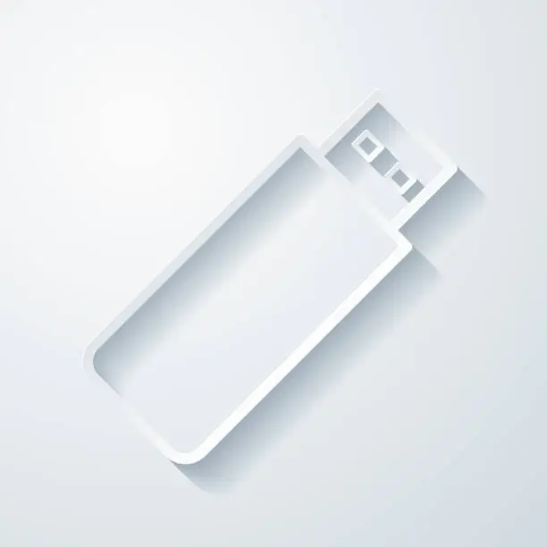 Vector illustration of USB flash drive. Icon with paper cut effect on blank background