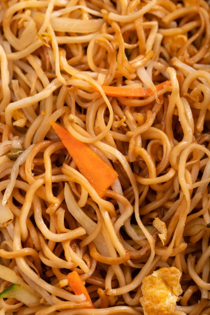 istock Noodles with verious vegetables and egg macro 1440191340