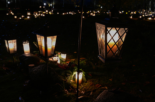 candle light on graveyard in Sweden All saints day november 5 2022