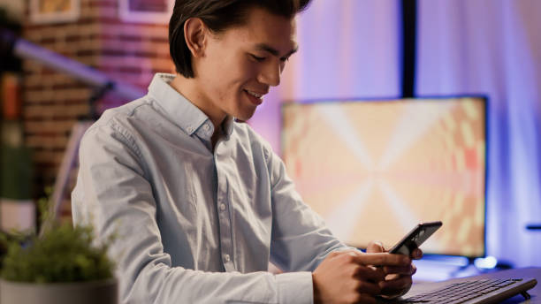 istock Male entrepreneur using smartphone on break to text messages 1440193240