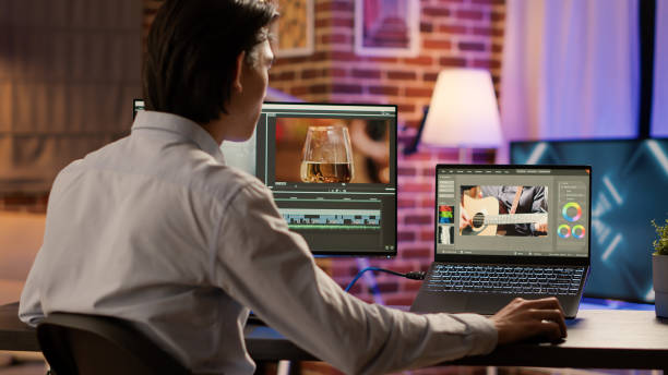 istock Asian videographer editing multimedia film footage on pc 1440193617