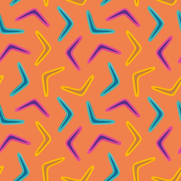 다채로운 부메랑이 있는 매끄러운 생생한 패턴, 포장, 섬유, 벽지, 인사말 카드에 적합 - boomerang souvenir australian culture symbol stock illustrations