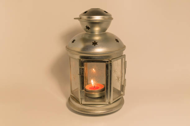 istock Golden lantern with a lighted candle 1440213445