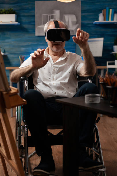 istock aged artist using vr glasses to draw masterpiece 1440213480