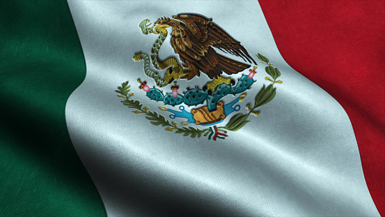 Detailed close up of the national flag of Mexico waving in the wind on a clear day. Democracy and politics. Latin american country. Selective focus.