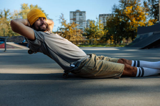 istock Skater relaxing with his skateboard. 1440220940