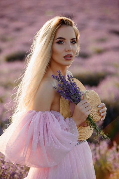 istock Young woman in the lavender field 1440221444