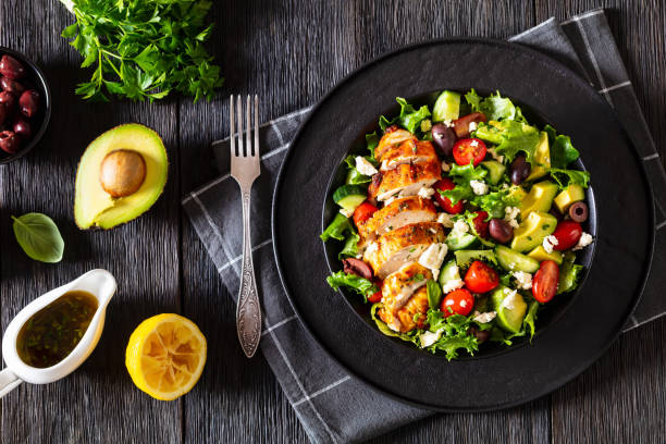 istock Mediterranean grilled Chicken Salad in black bowl 1440222047