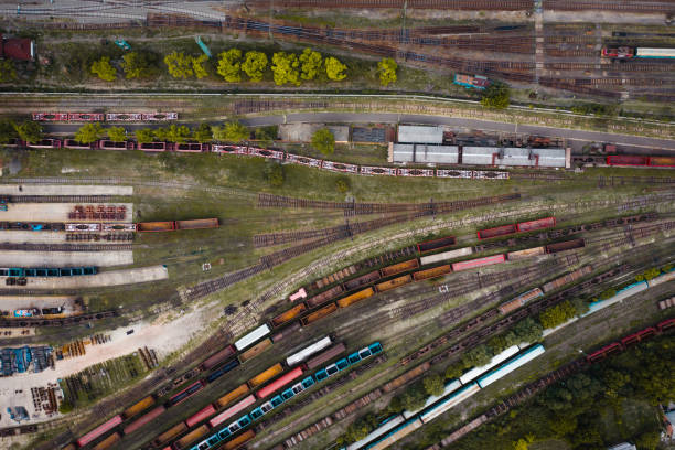 istock Top view of colorful cargo trains. 1440224052