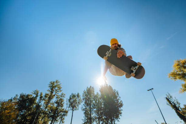 istock Skater flying with skateboard. 1440225141