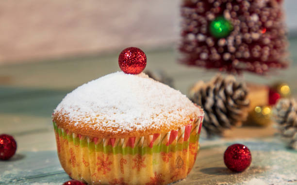 Christmas muffin with red decoration stock photo