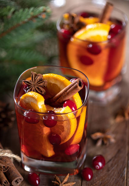 istock Mulled wine with orange slices, cranberries and spices 1440230045