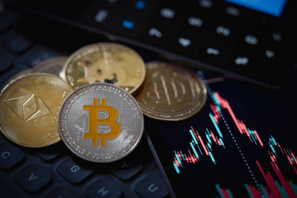 Bitcoin and Ethereum cryptocurrency with candle stick graph chart, laptop keyboard, and digital background Gold Bitcoin and Ethereum cryptocurrency coins with candle stick graph chart, laptop keyboard, and digital background. crypto currency stock pictures, royalty-free photos & images