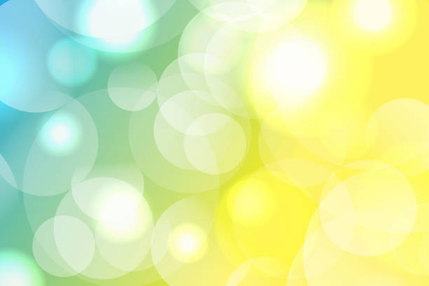 istock abstract yellow and blue bokeh color nature background, Defocused Defused Blur Bubble Background. 1440244083