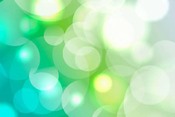 Vector illustration of Decorative green and white   defocused spring lights background. Colorful   abstract bokeh .