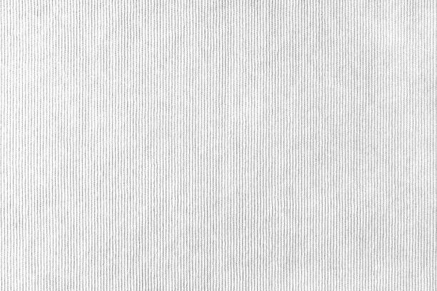 istock White velveteen upholstery fabric texture background. 1440244735