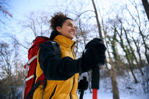 istock Young woman hiking during the winter 1440249197