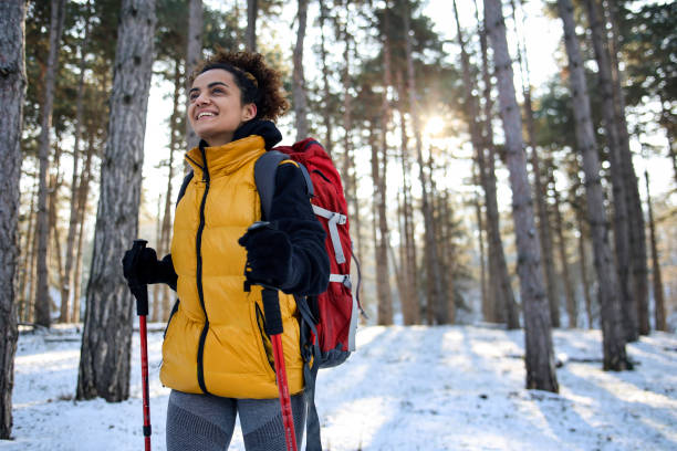 istock Young woman hiking during the winter 1440249407