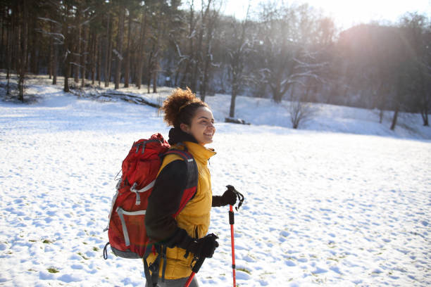 istock Young woman hiking during the winter 1440250022