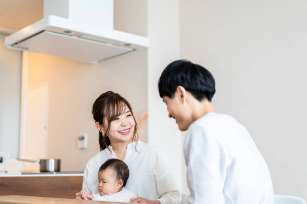 istock Happy families with healthy babies 1440254947