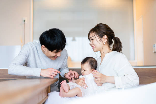 istock Happy families with healthy babies 1440254951