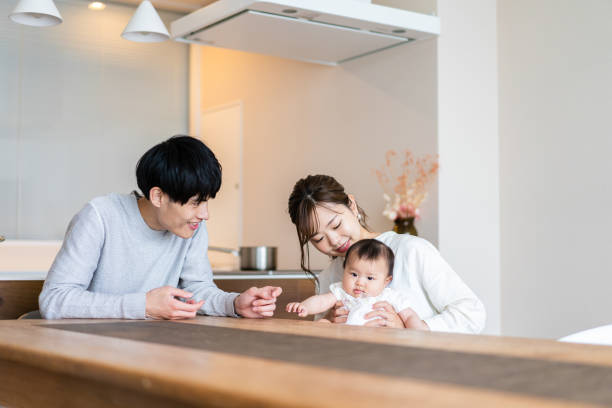 istock Happy families with healthy babies 1440254955