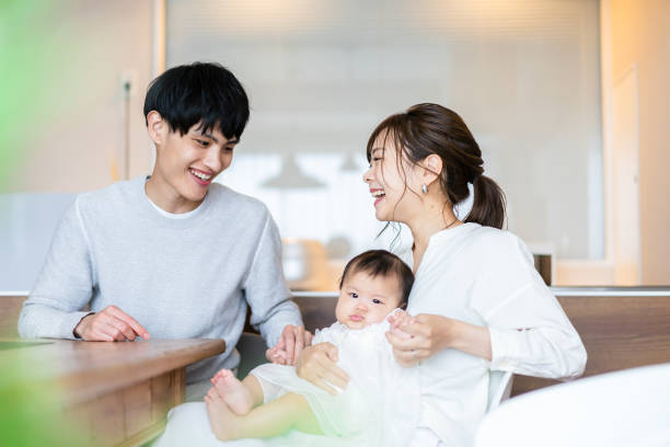 istock Happy families with healthy babies 1440254957