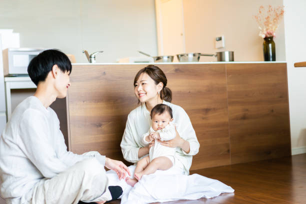 istock Happy families with healthy babies 1440254961