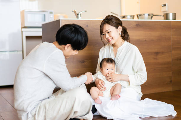 istock Happy families with healthy babies 1440254962