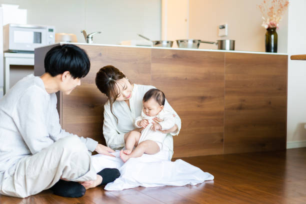 istock Happy families with healthy babies 1440254967