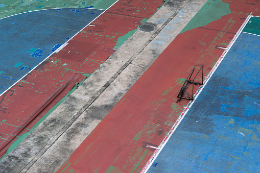 Colorful football pitch in the centre of Bangkok. Red, blue and green.