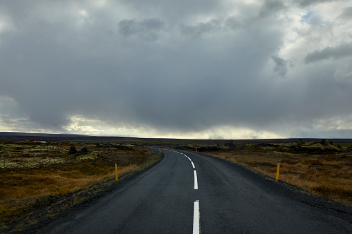 Ring road and cloudscape at autumn in North Iceland